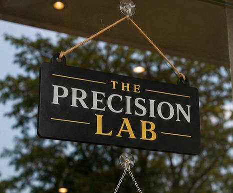 The Precision Lab door sign